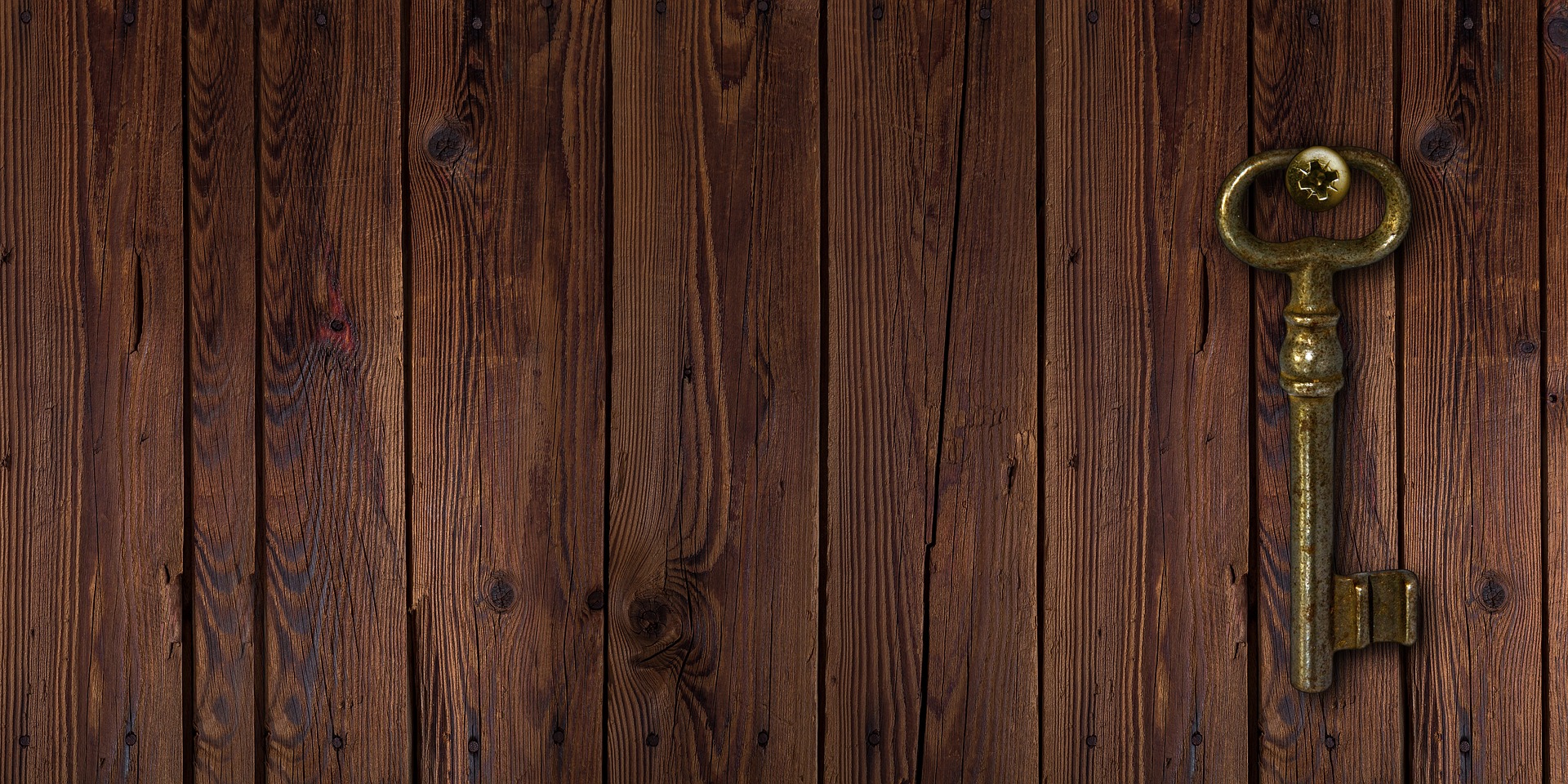 Holzwand mit Schlüssel daran (Bild von Gerd Altmann auf Pixabay)